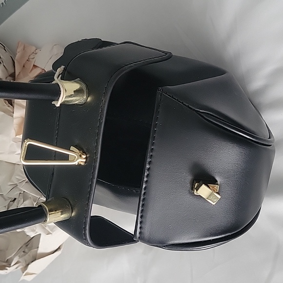 Wrist purse in black with gold closure - Picture 5 of 5